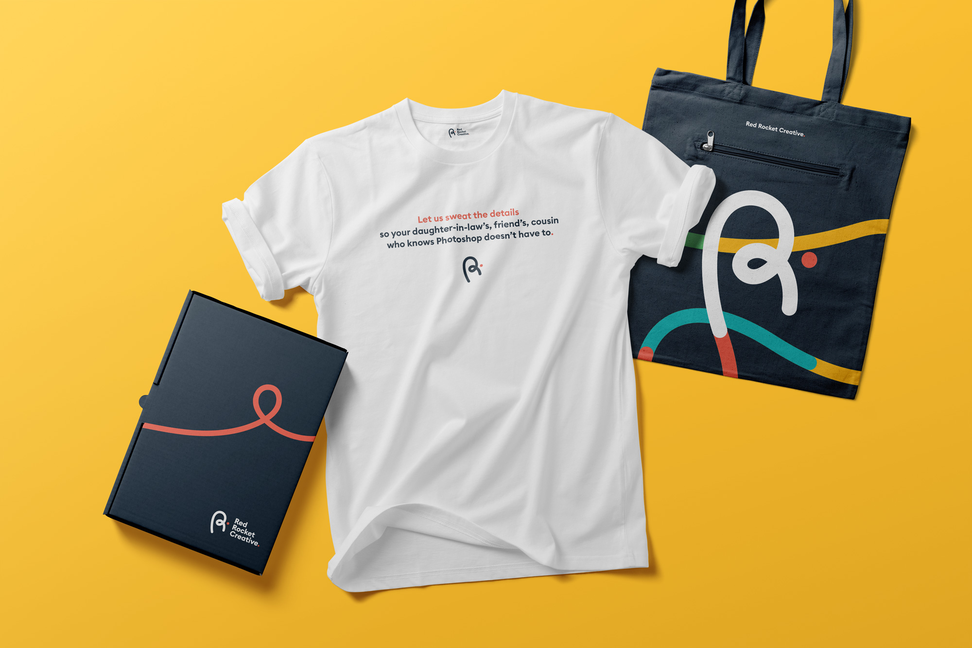 Red Rocket Creative swag T-shirt with slogan and canvas bag with logo
