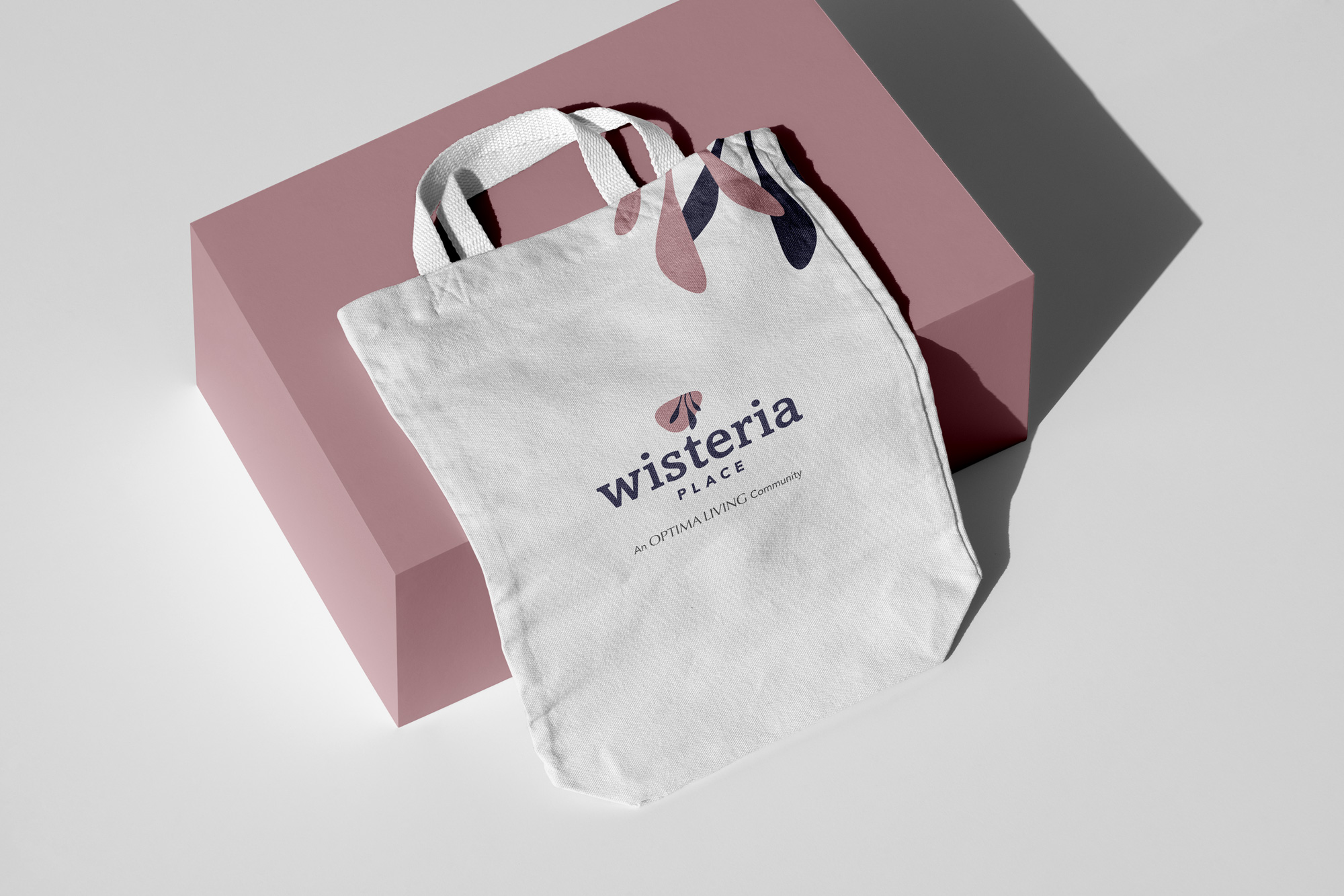 Canvas bag with Wisteria Place logo on it